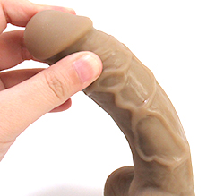 反りかえるムキムキボディのディルドです。