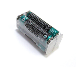 ※アダプタをとりだして電池をセット